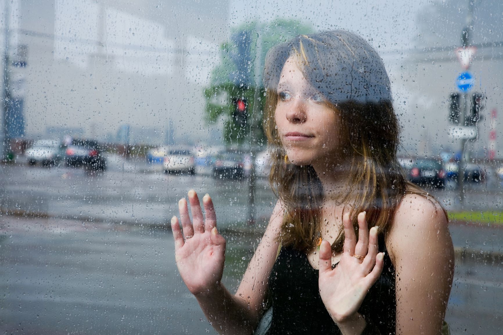 girl behind window